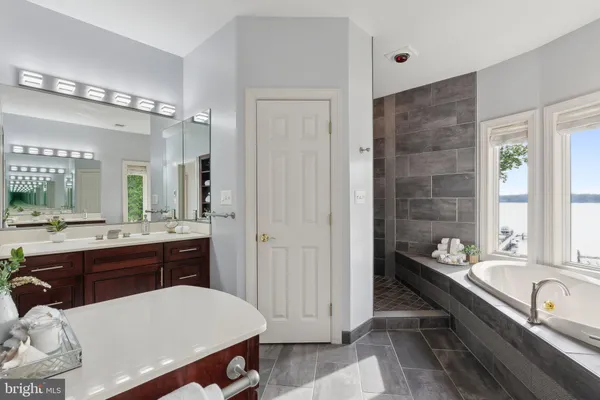 a bathroom with a glass door shower