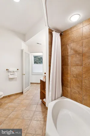a bathroom with a bathtub