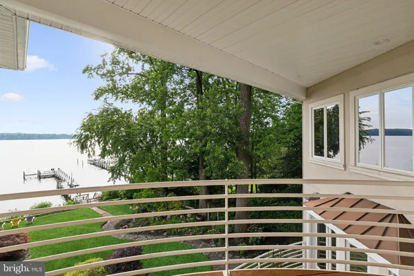 a view of a balcony with an outdoor space