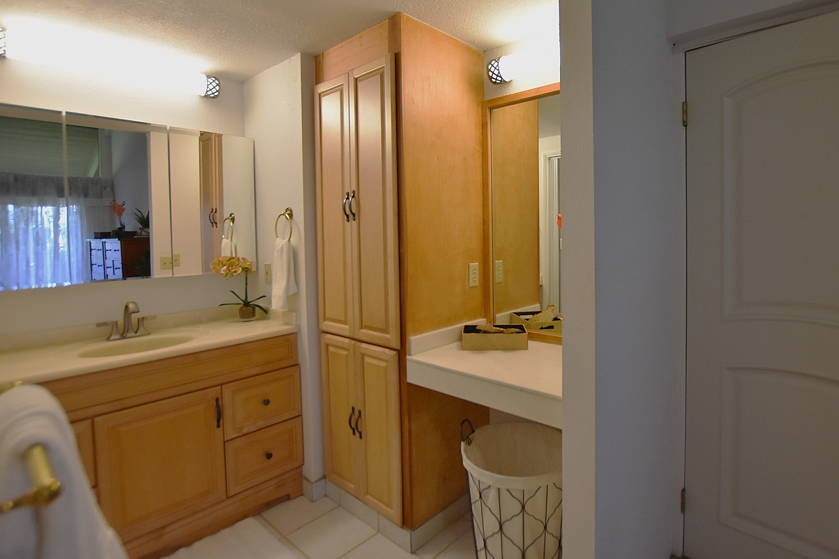68-3840 Lua Kula Street, Unit D203 Waikoloa, HI 96738 - Photo 11 of 30 a en suite bathroom with a sink double vanity and a mirror