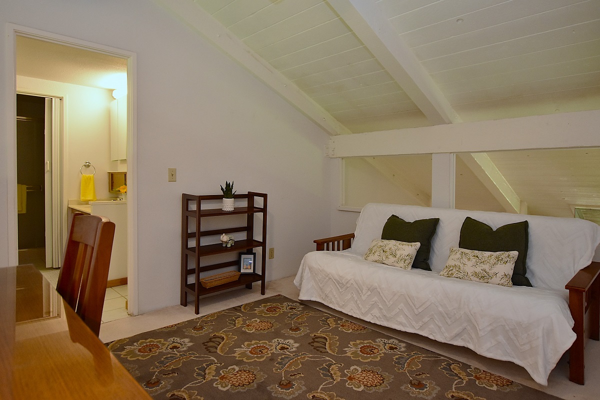 68-3840 Lua Kula Street, Unit D203 Waikoloa, HI 96738 - Photo 16 of 30 a bedroom with a bed and furniture