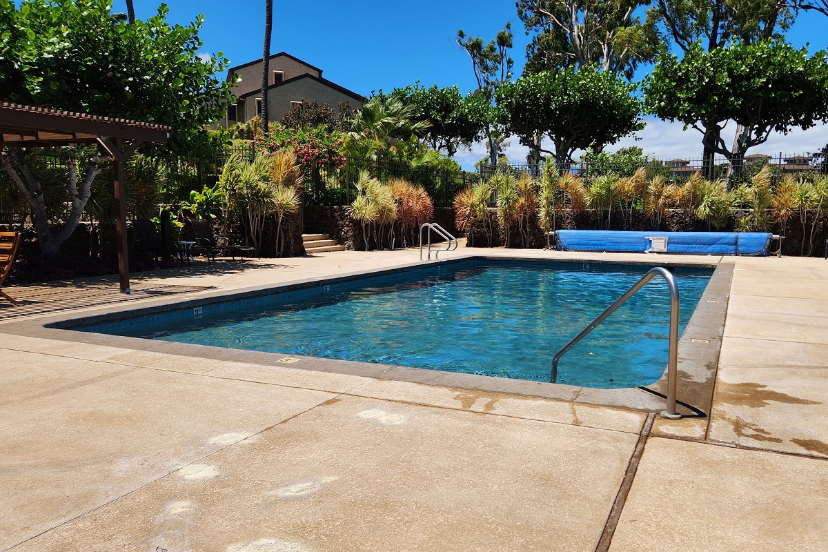 68-3840 Lua Kula Street, Unit D203 Waikoloa, HI 96738 - Photo 23 of 30 a view of a swimming pool with a patio
