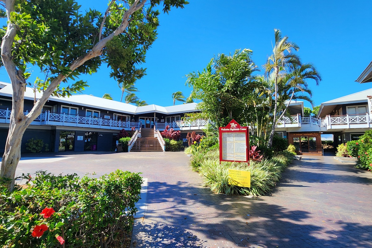 68-3840 Lua Kula Street, Unit D203 Waikoloa, HI 96738 - Photo 29 of 30 a front view of a house with a yard and a tree