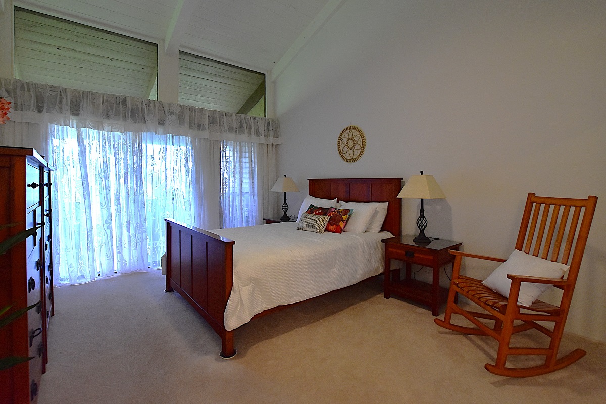 68-3840 Lua Kula Street, Unit D203 Waikoloa, HI 96738 - Photo 8 of 30 a bed sitting in a room next to a window