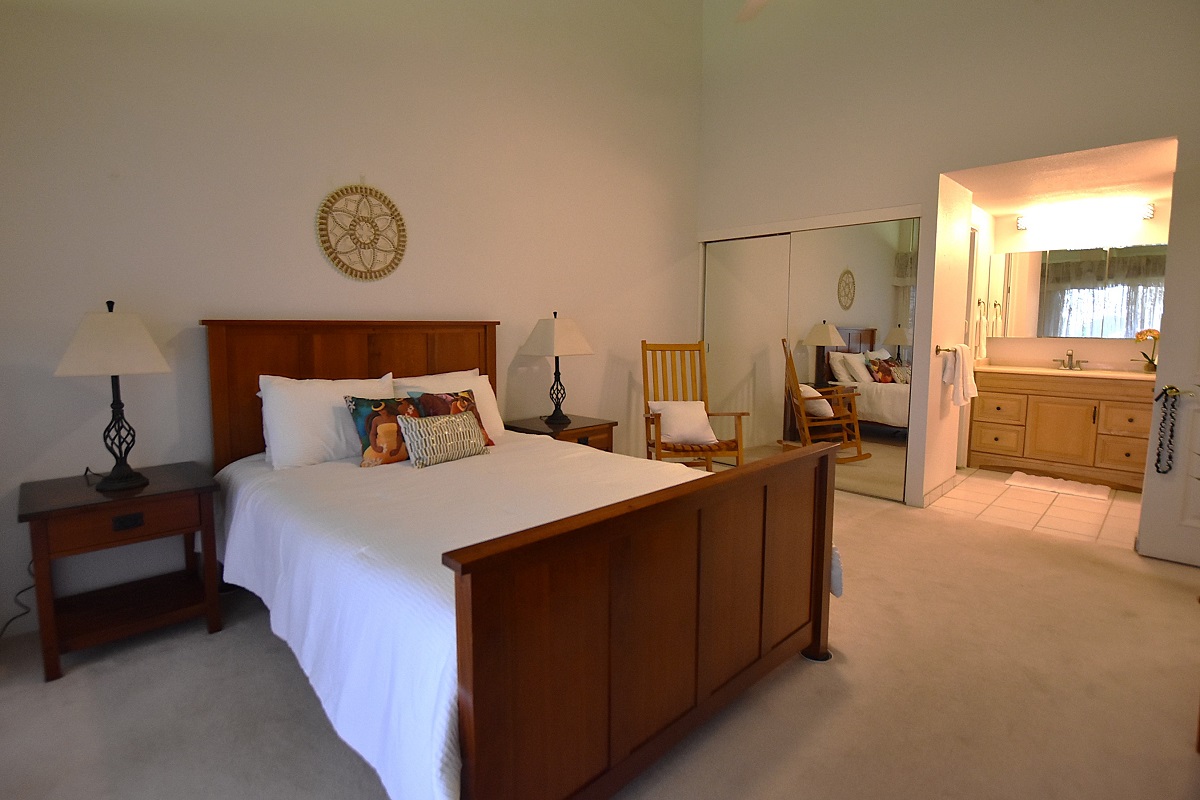 68-3840 Lua Kula Street, Unit D203 Waikoloa, HI 96738 - Photo 9 of 30 a bedroom with a bed and window