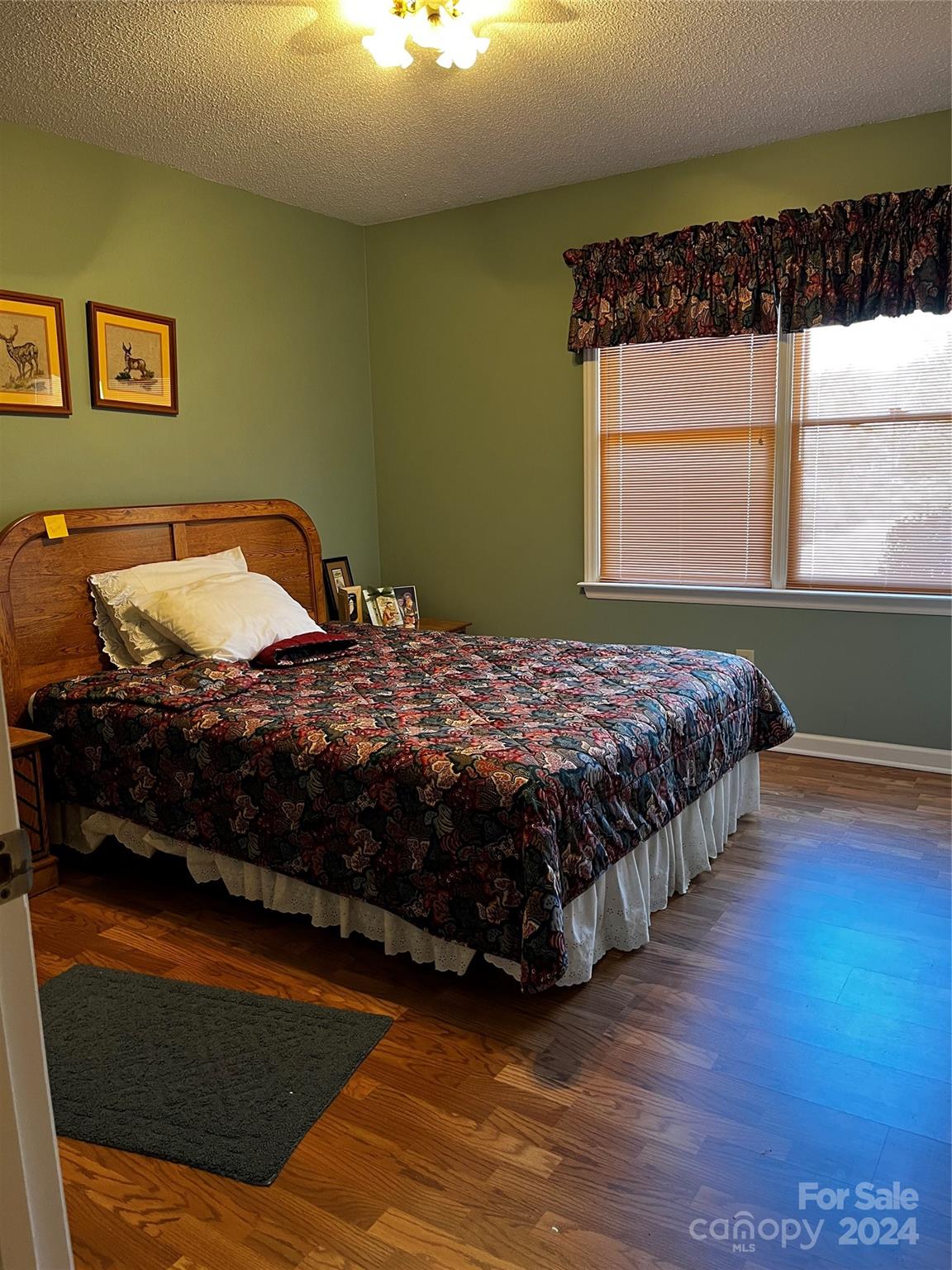2239 Tryon Courthouse Road Bessemer City, NC 28016 - Photo 19 of 26 a bedroom with a bed and window