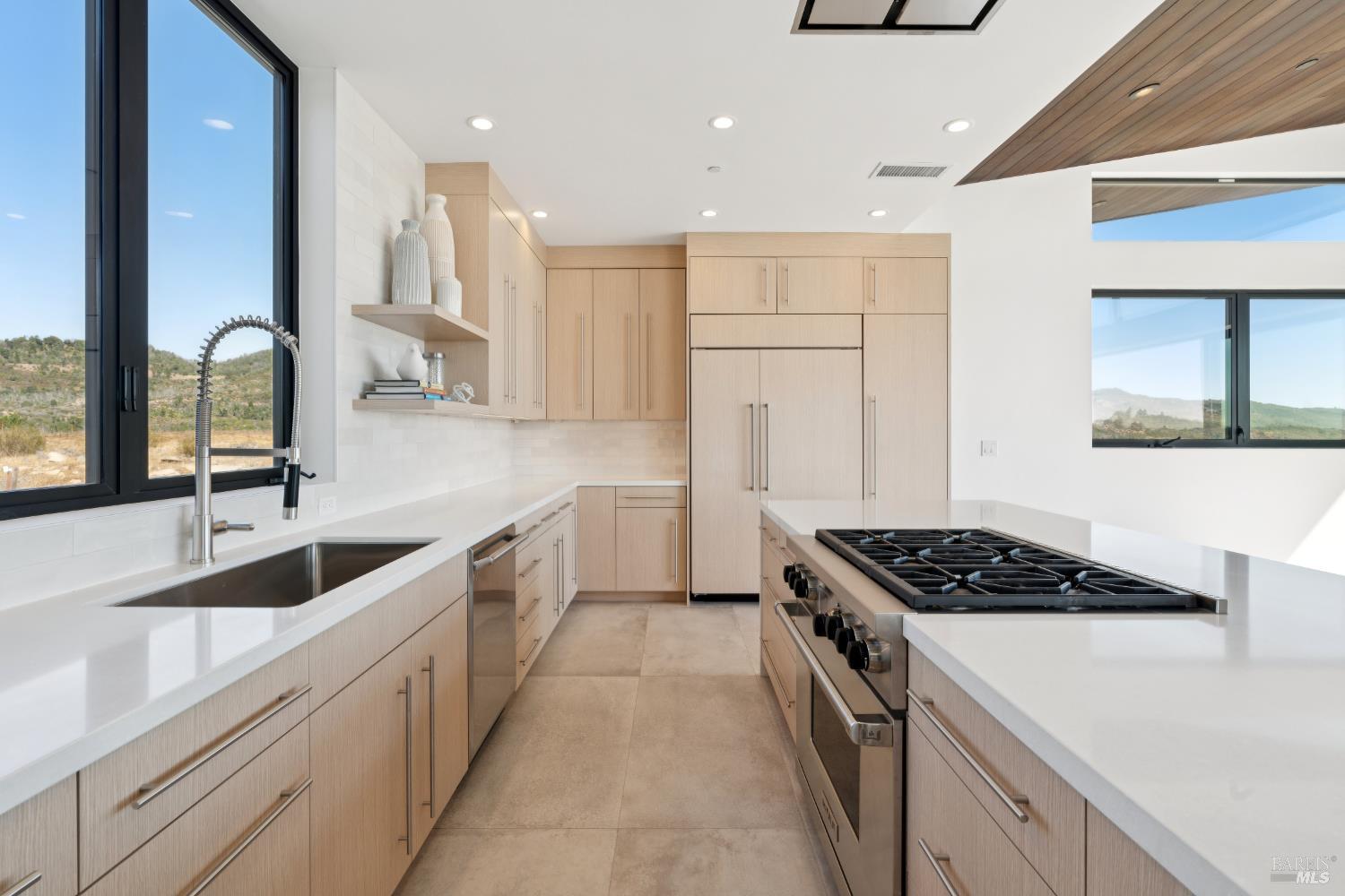 3400 Atlas Peak Road Napa, CA 94558 - Photo 13 of 34 a kitchen with white cabinets and appliances