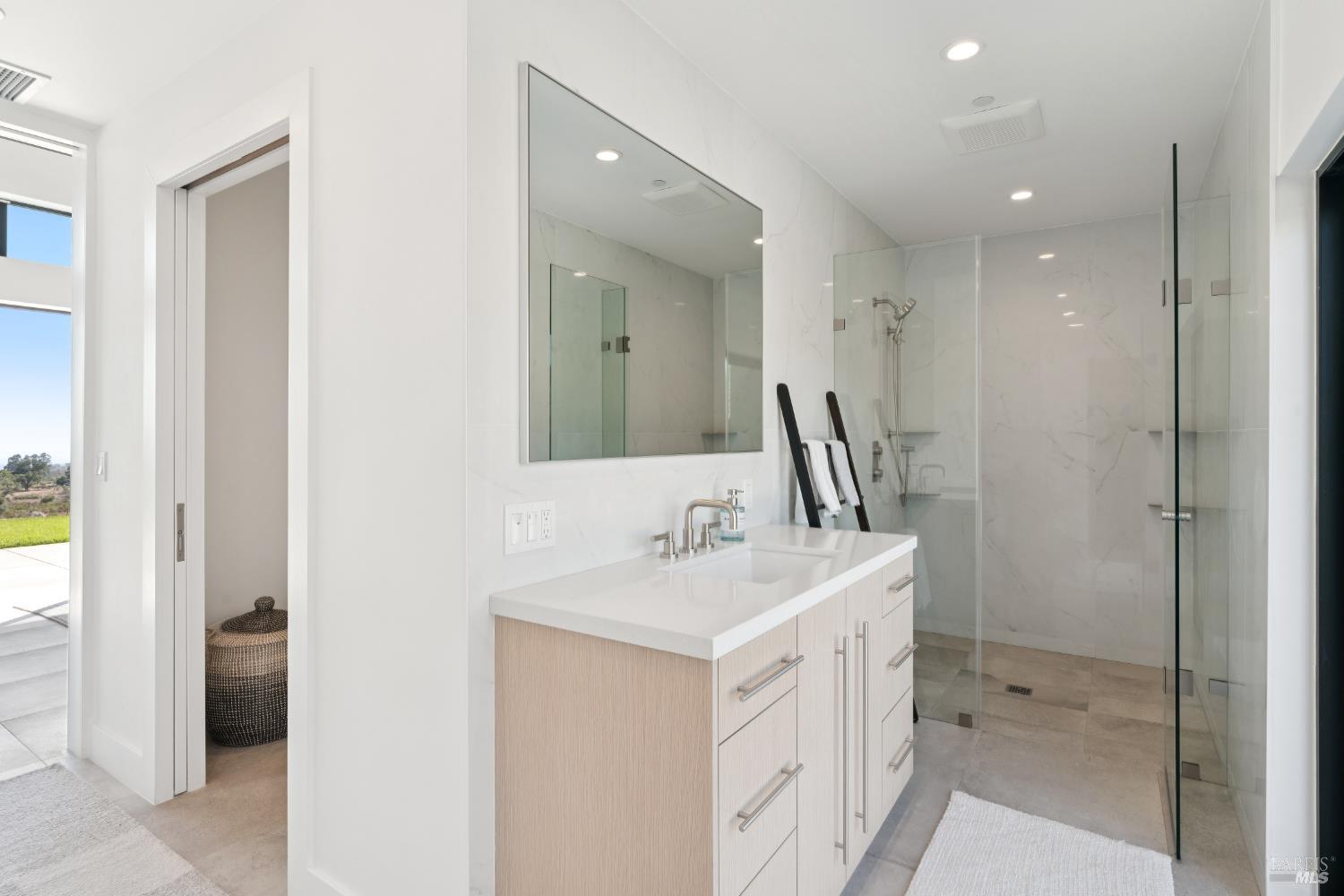 3400 Atlas Peak Road Napa, CA 94558 - Photo 18 of 34 a bathroom with a sink and a mirror