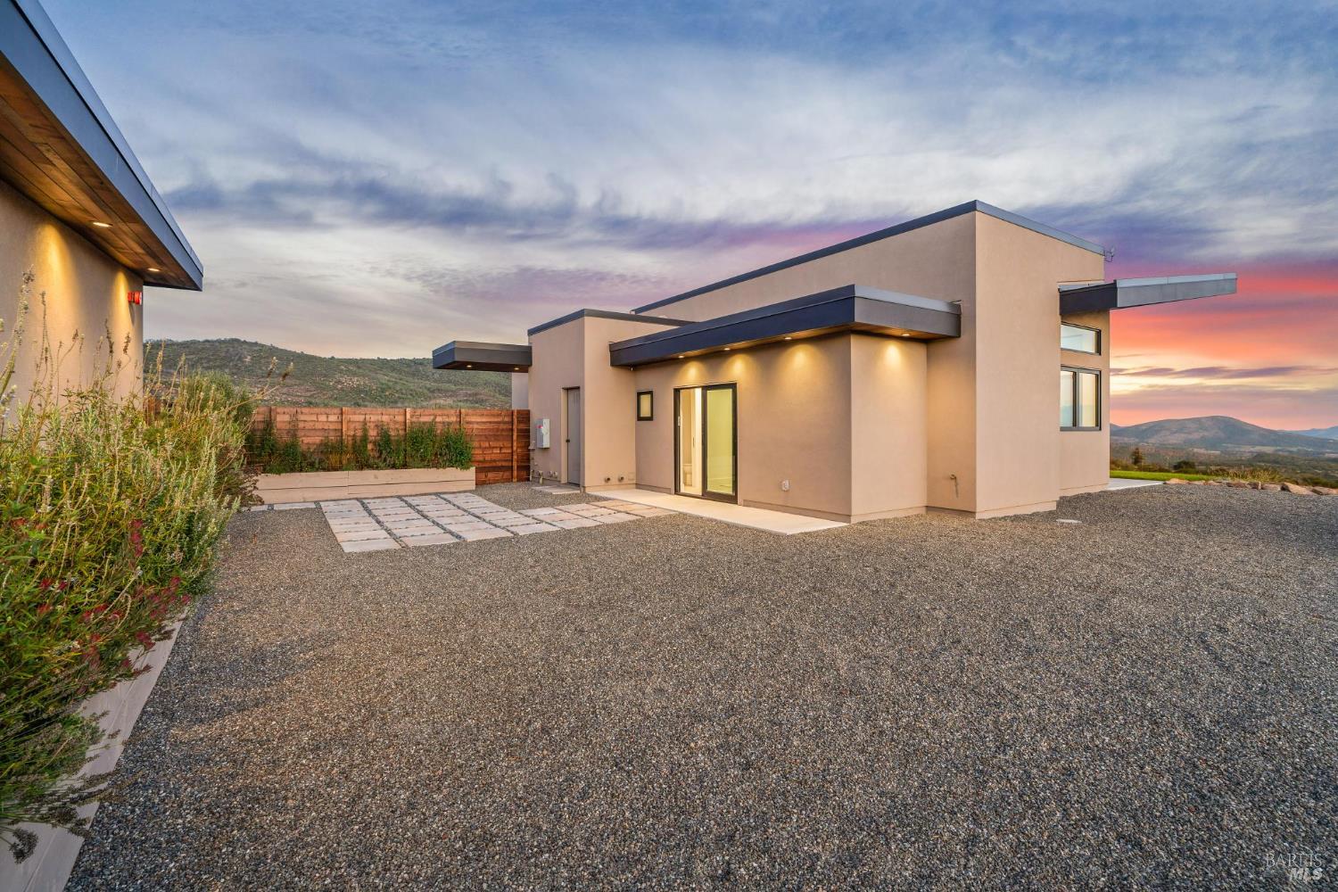 3400 Atlas Peak Road Napa, CA 94558 - Photo 22 of 34 a view of a house with a yard