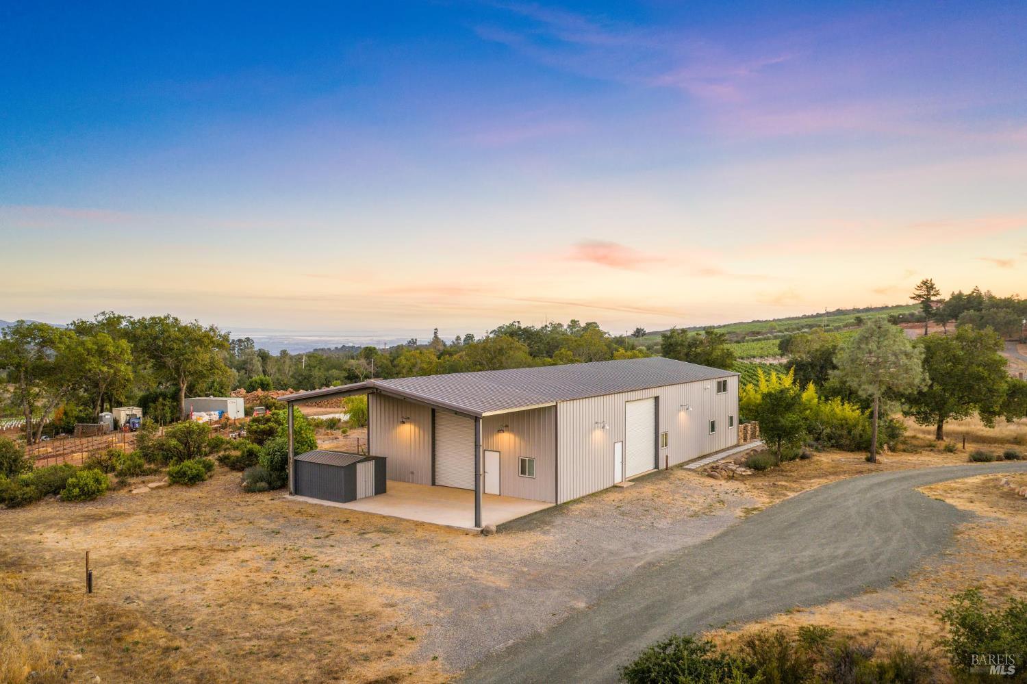 3400 Atlas Peak Road Napa, CA 94558 - Photo 24 of 34 a view of a road with a big yard