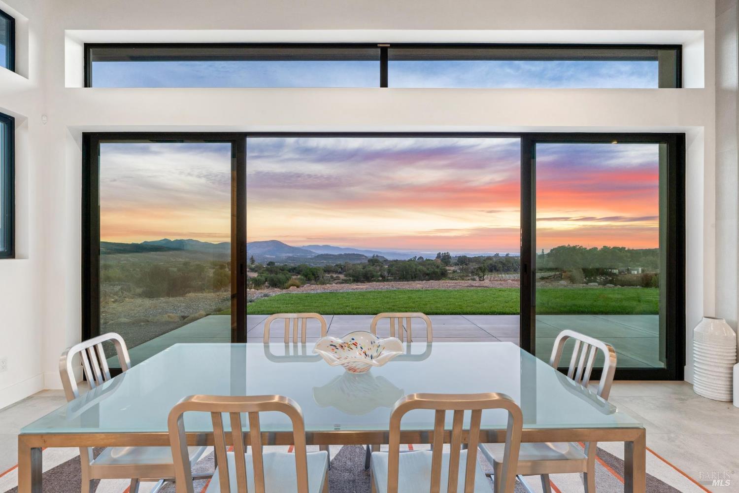 3400 Atlas Peak Road Napa, CA 94558 - Photo 5 of 34 a view of a patio with a table chairs and a table