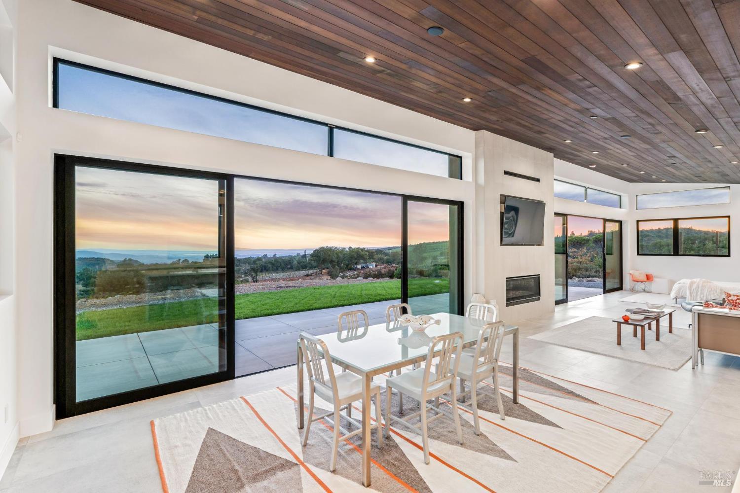 3400 Atlas Peak Road Napa, CA 94558 - Photo 7 of 34 a living room with large windows