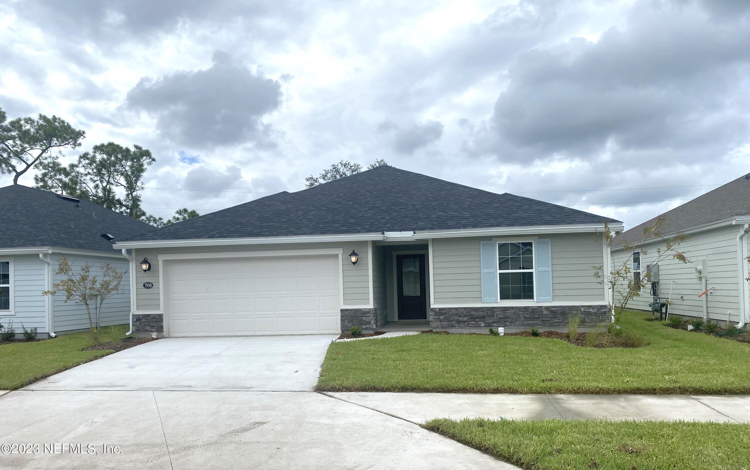 7930 Rippa Valley Way Jacksonville, FL 32222 - Photo 1 of 19 1- front of home (12)