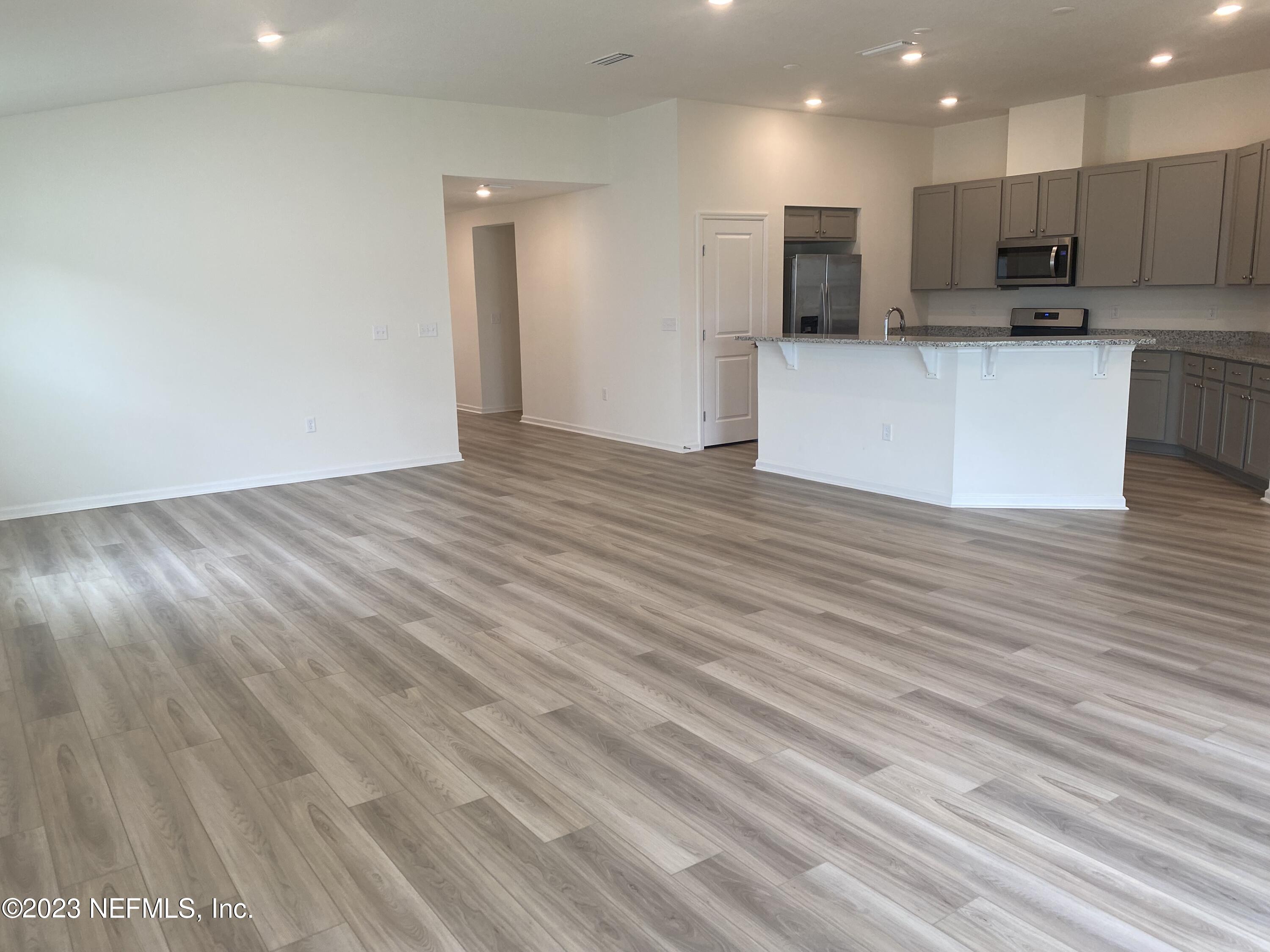7930 Rippa Valley Way Jacksonville, FL 32222 - Photo 17 of 19 3- great room (4)