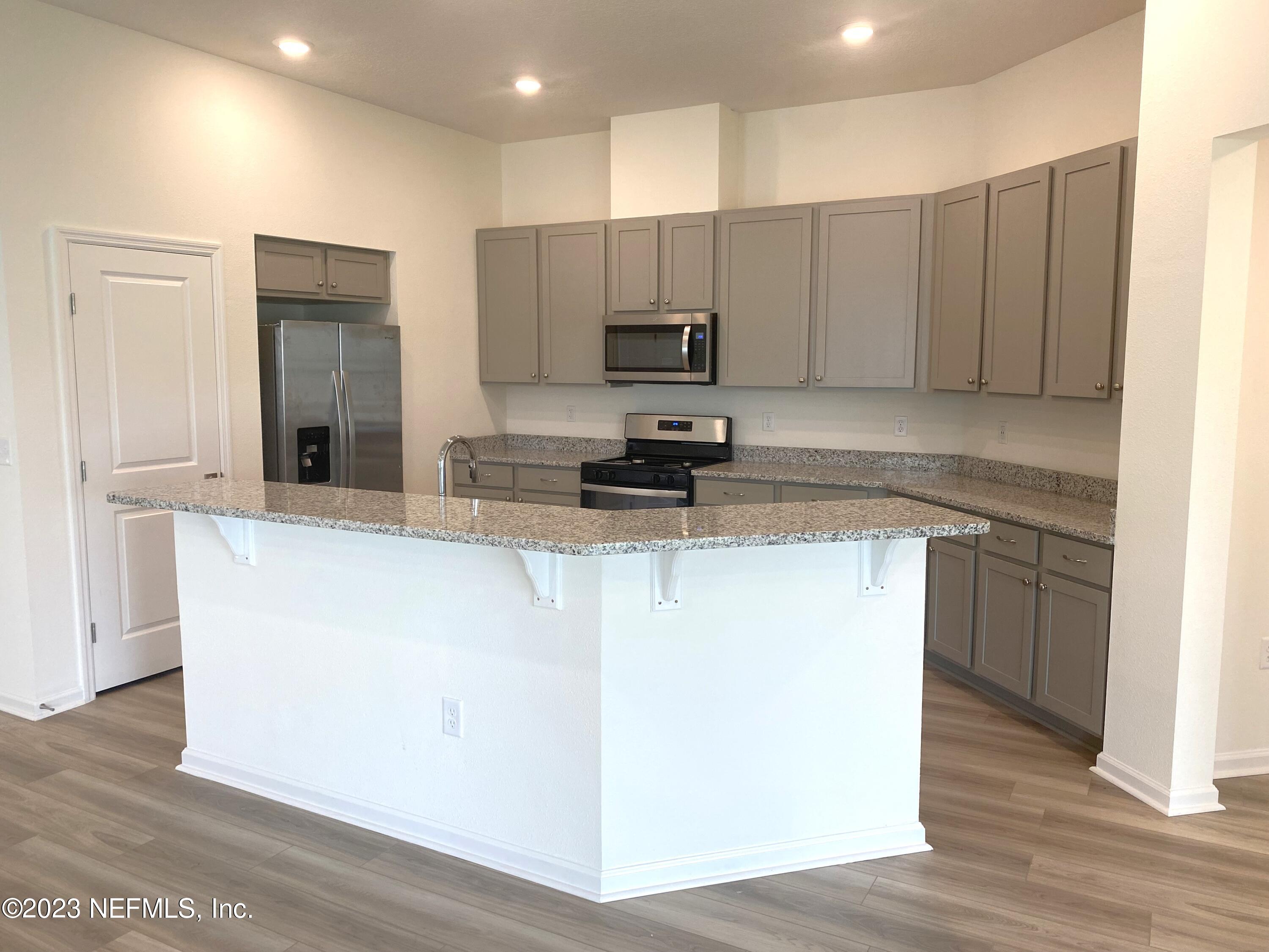 7930 Rippa Valley Way Jacksonville, FL 32222 - Photo 3 of 19 5- kitchen (1)