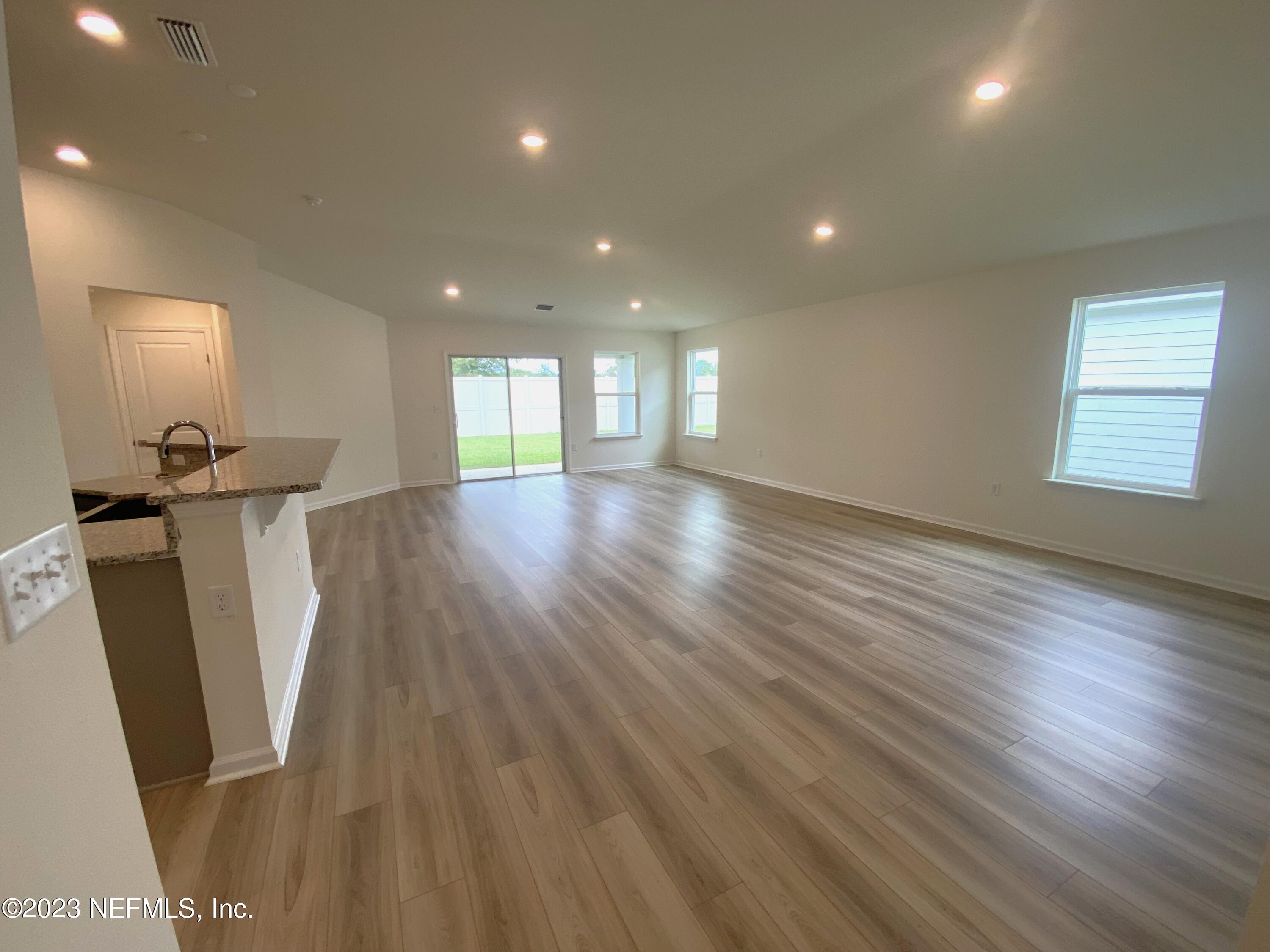 7930 Rippa Valley Way Jacksonville, FL 32222 - Photo 5 of 19 7- great room (2)