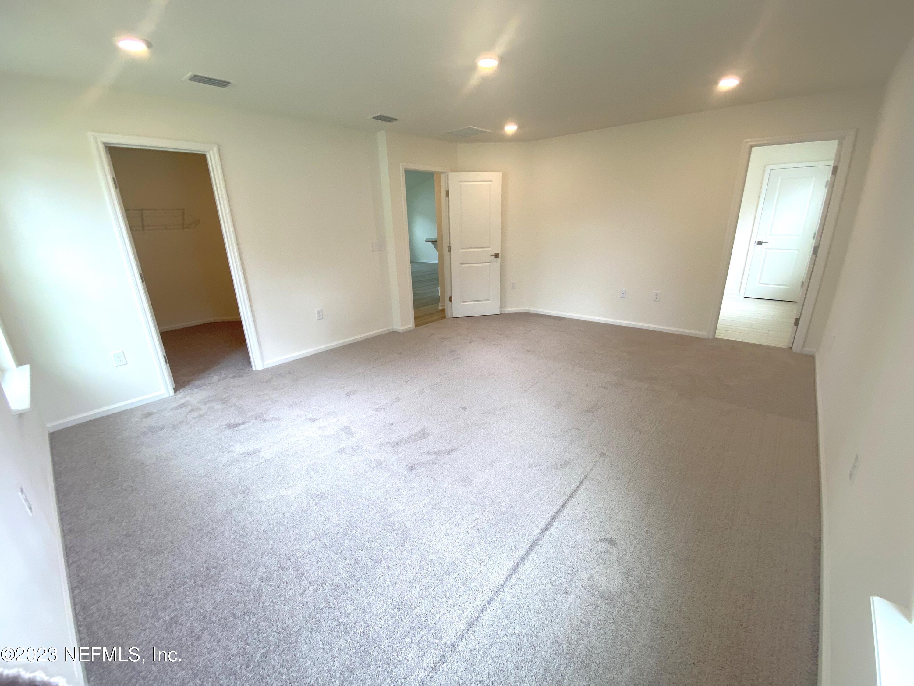 7930 Rippa Valley Way Jacksonville, FL 32222 - Photo 8 of 19 14- primary bedroom