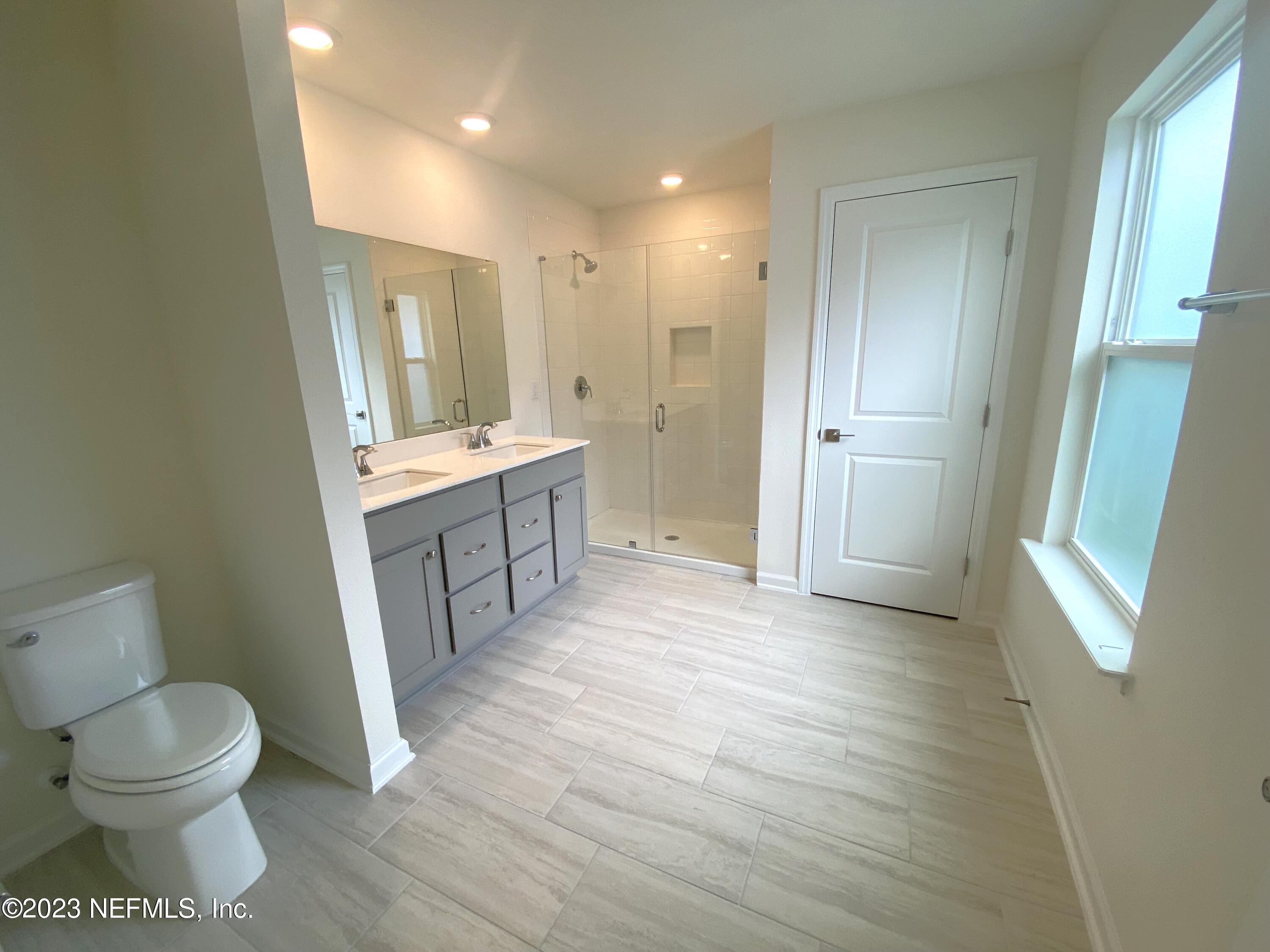 7930 Rippa Valley Way Jacksonville, FL 32222 - Photo 9 of 19 13- primary bath