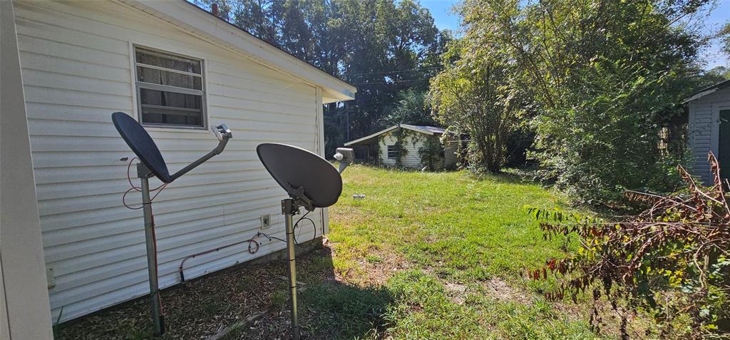 403 North Park Drive Springhill, LA 71075 - Photo 21 of 31 a view of backyard with seating area and green space