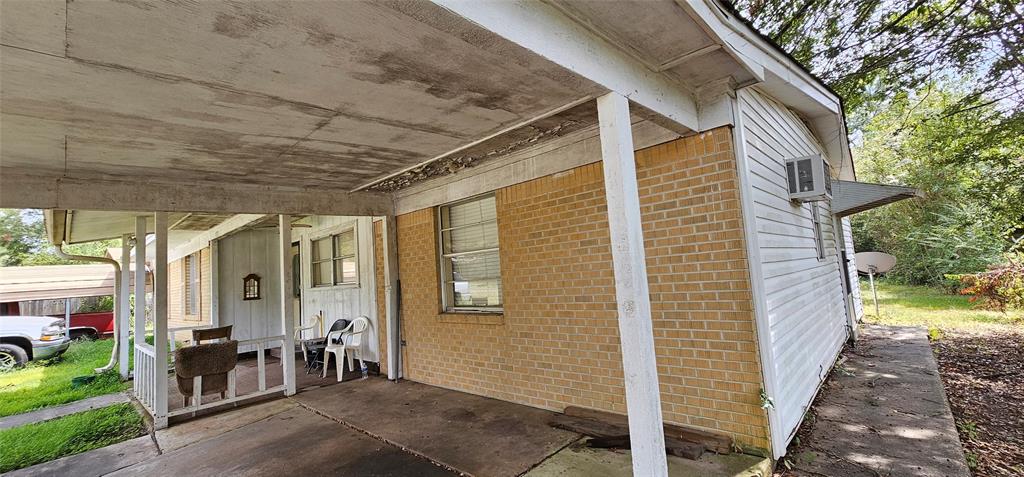 403 North Park Drive Springhill, LA 71075 - Photo 25 of 31 a view of a porch with chairs and backyard