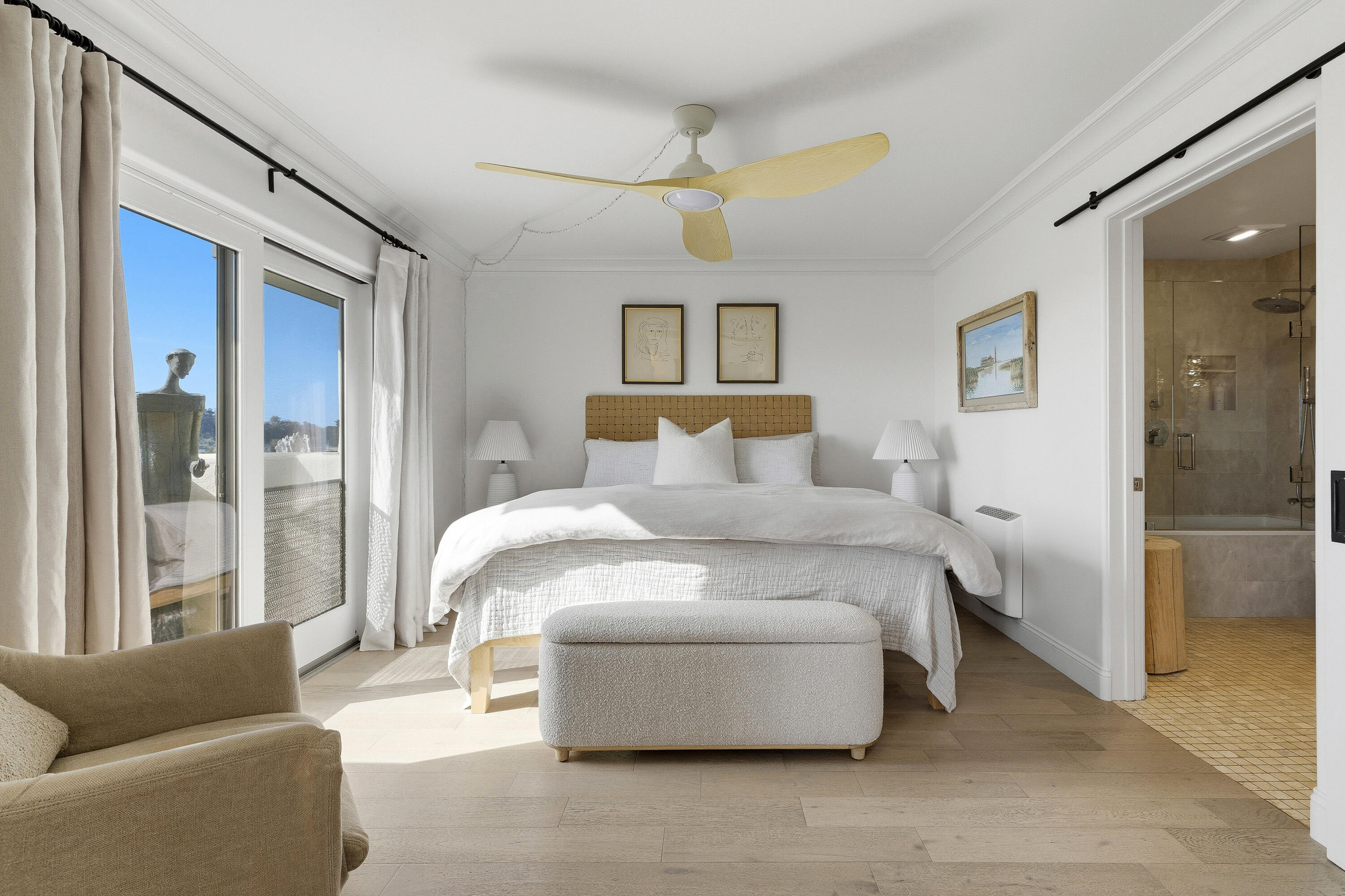 3375 Foothill Road, Unit 923 Carpinteria, CA 93013 - Photo 13 of 25 a bedroom with a bed couch and a window