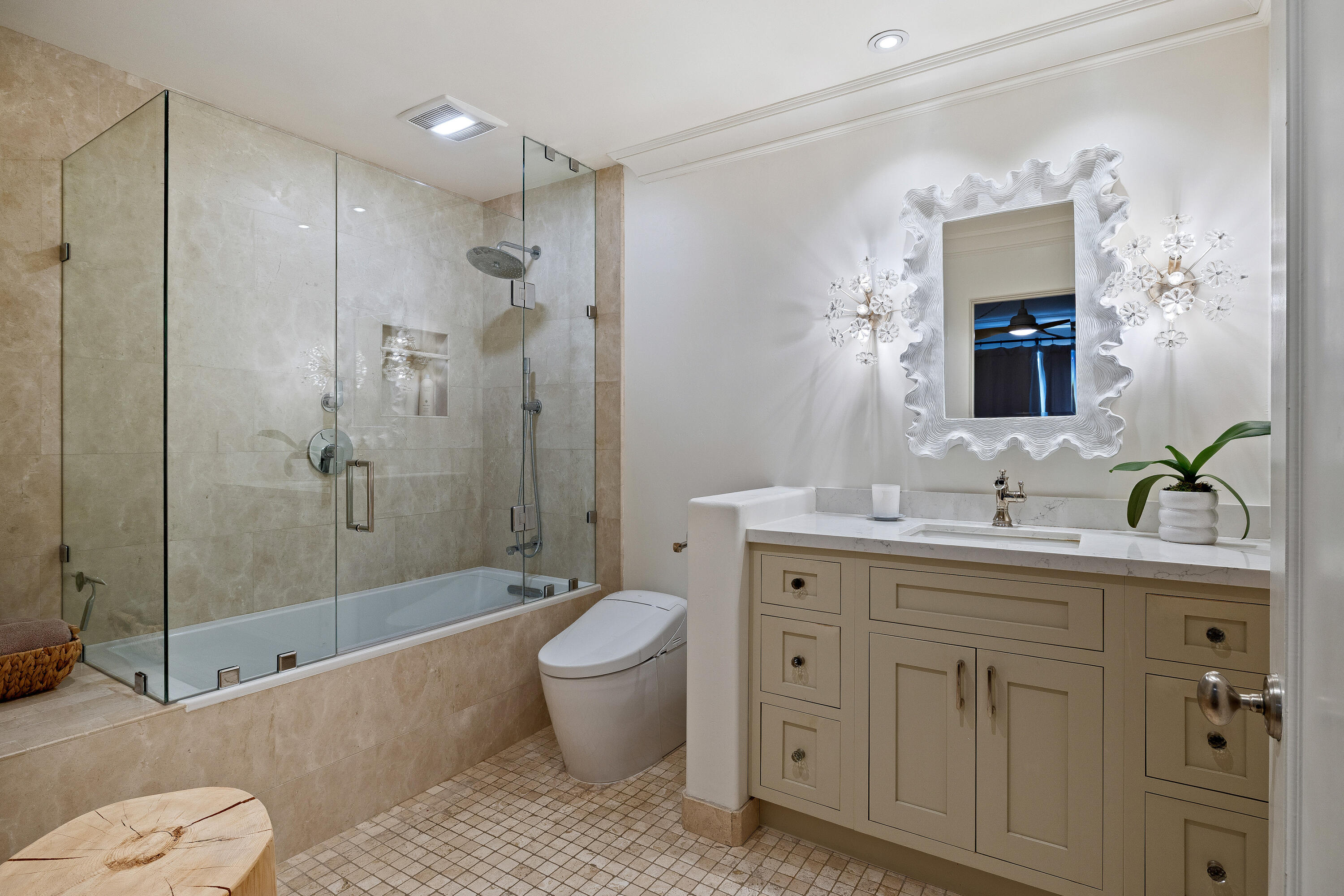 3375 Foothill Road, Unit 923 Carpinteria, CA 93013 - Photo 14 of 25 a spacious bathroom with a granite countertop sink toilet and shower