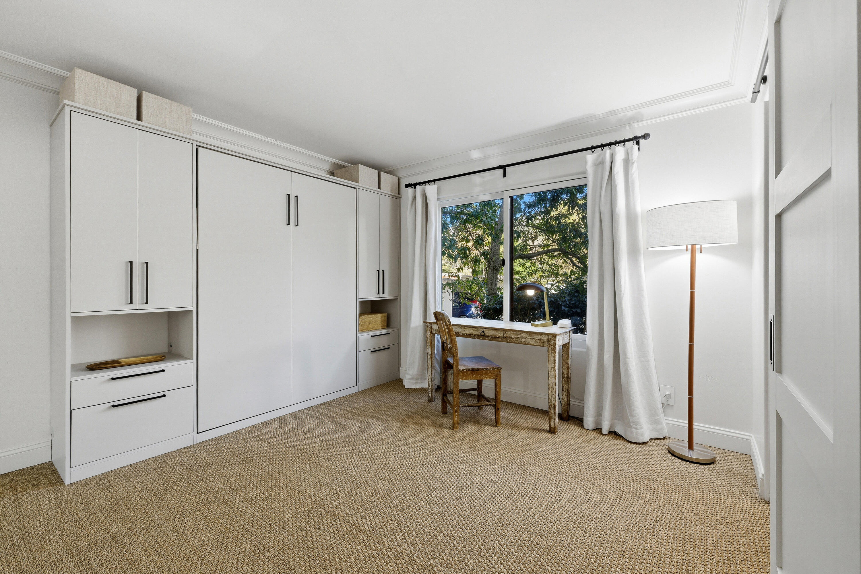 3375 Foothill Road, Unit 923 Carpinteria, CA 93013 - Photo 14 of 23 a view of an empty room with a fireplace and a window