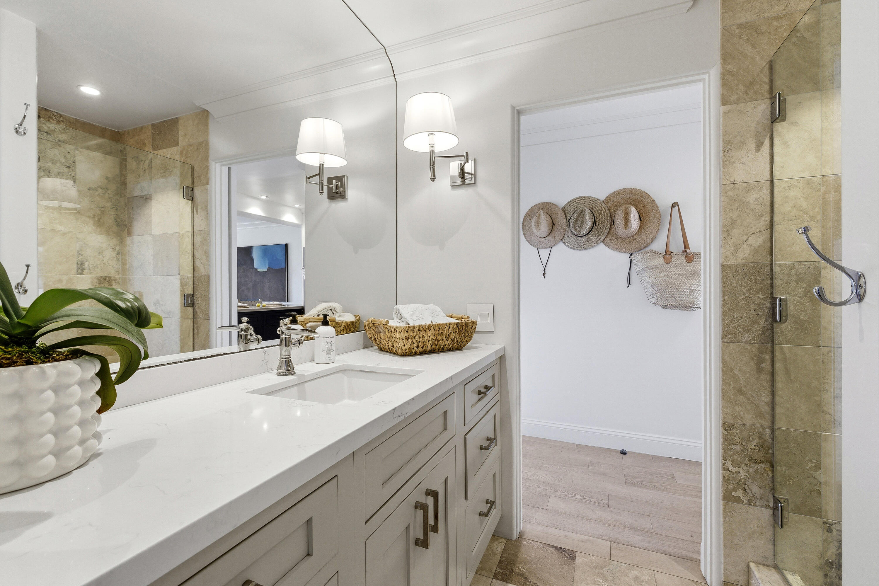 3375 Foothill Road, Unit 923 Carpinteria, CA 93013 - Photo 16 of 23 a bathroom with a sink and a mirror