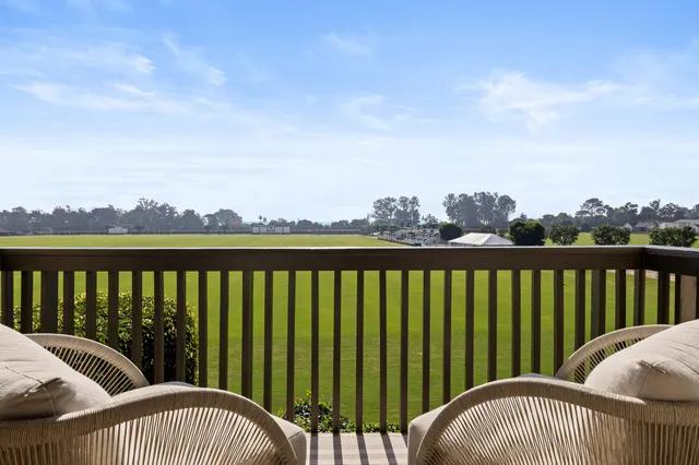 a view of balcony with furniture
