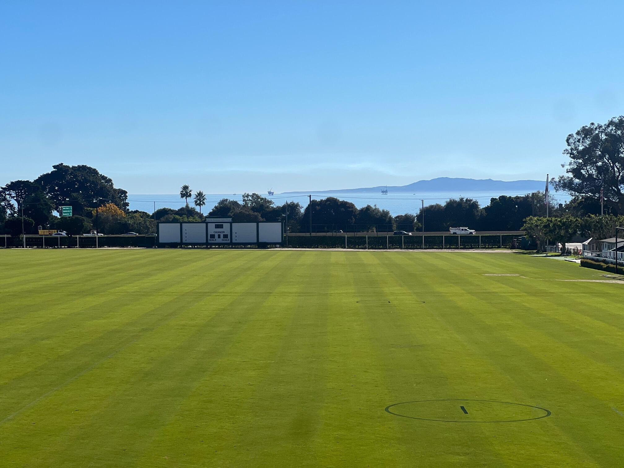3375 Foothill Road, Unit 923 Carpinteria, CA 93013 - Photo 3 of 25 a view of a lake with houses in the background