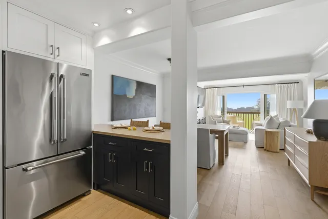 a kitchen with a refrigerator a sink and dishwasher