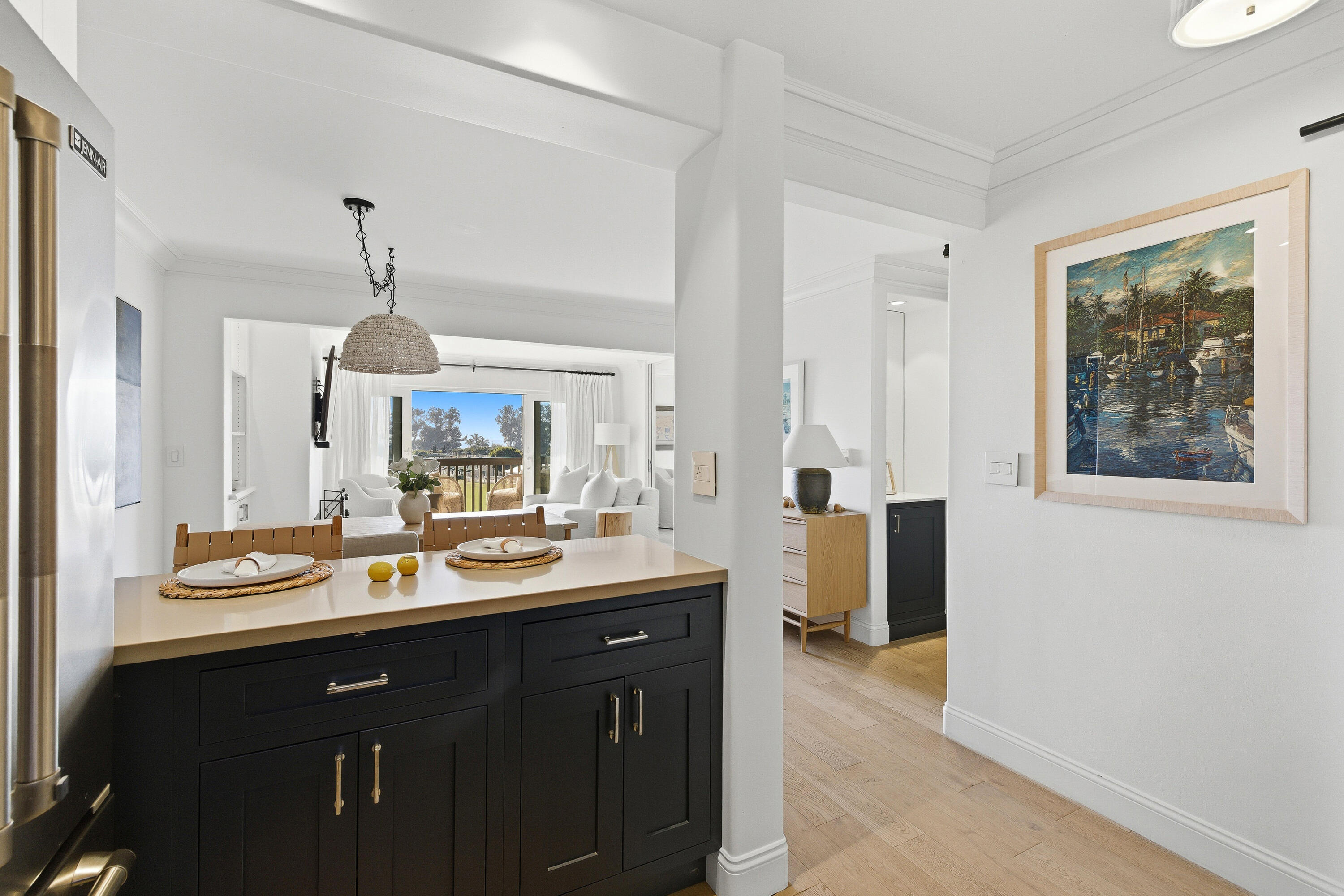 3375 Foothill Road, Unit 923 Carpinteria, CA 93013 - Photo 8 of 23 a kitchen with a sink and a refrigerator