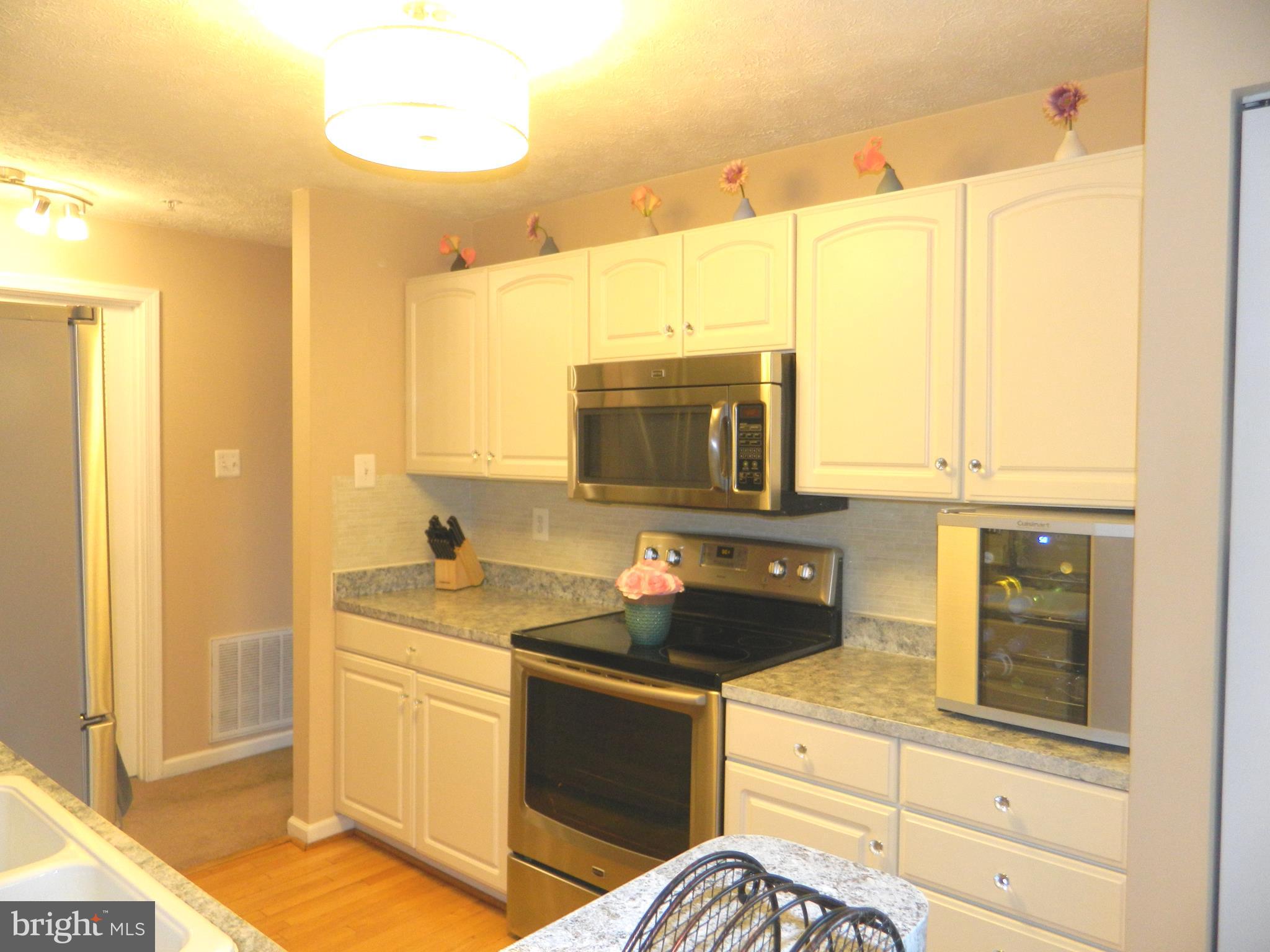8253 Poplar Mill Road, Unit 8253 Baltimore, MD 21236 - Photo 18 of 34 Step saver kitchen