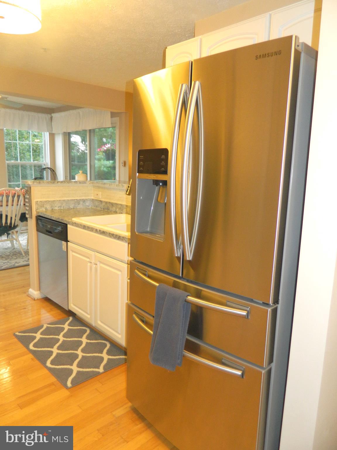 8253 Poplar Mill Road, Unit 8253 Baltimore, MD 21236 - Photo 20 of 34 Two drawer frig with ice and water to the touch