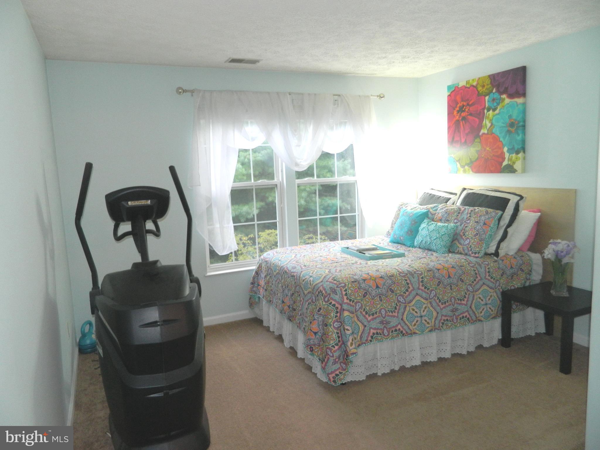 8253 Poplar Mill Road, Unit 8253 Baltimore, MD 21236 - Photo 26 of 34 Second bedroom is roomy and light filled