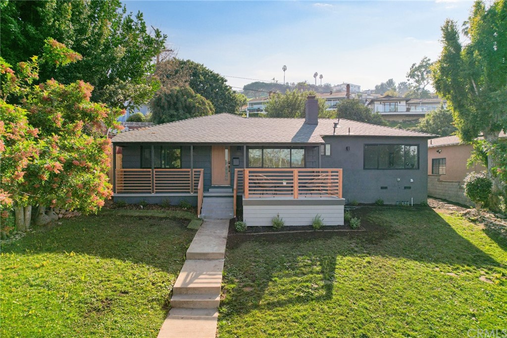 a house view with a garden space
