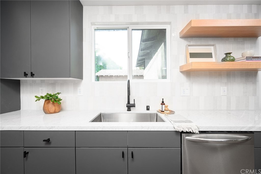 5418 Sanchez Drive Los Angeles, CA 90008 - Photo 13 of 28 a kitchen with a sink and a window