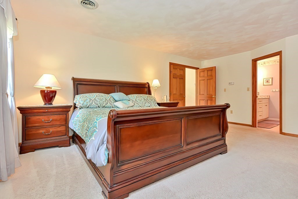 2 Harrison Place Franklin, MA 02038 - Photo 18 of 34 a bedroom with a bed and dresser