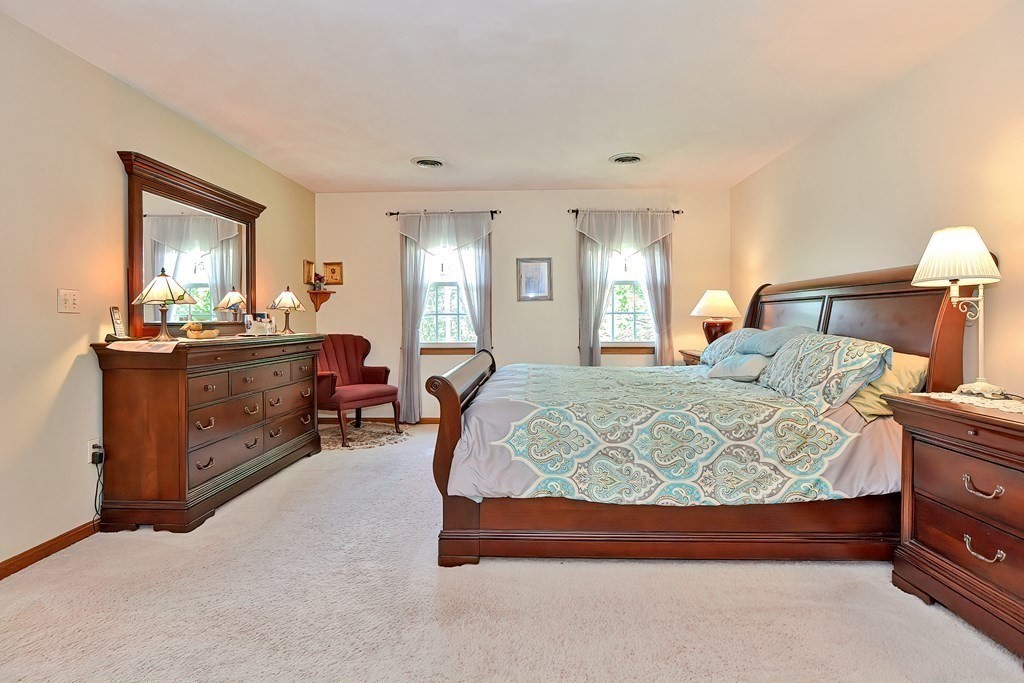 2 Harrison Place Franklin, MA 02038 - Photo 19 of 34 a bed room with a bed and furniture