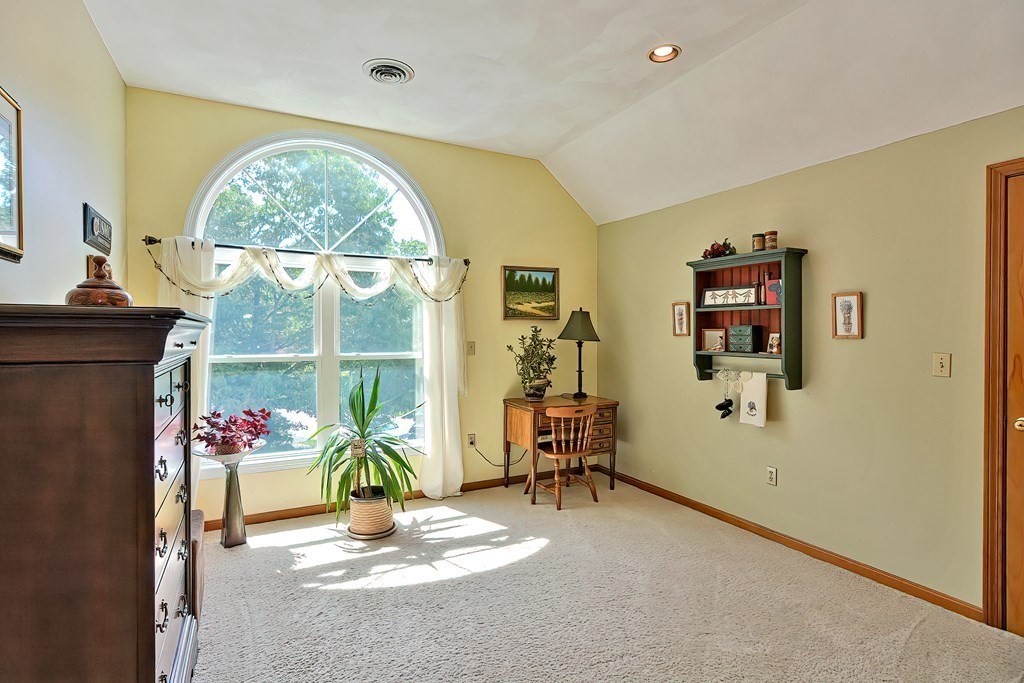 2 Harrison Place Franklin, MA 02038 - Photo 20 of 34 a living room with furniture large window and a chandelier