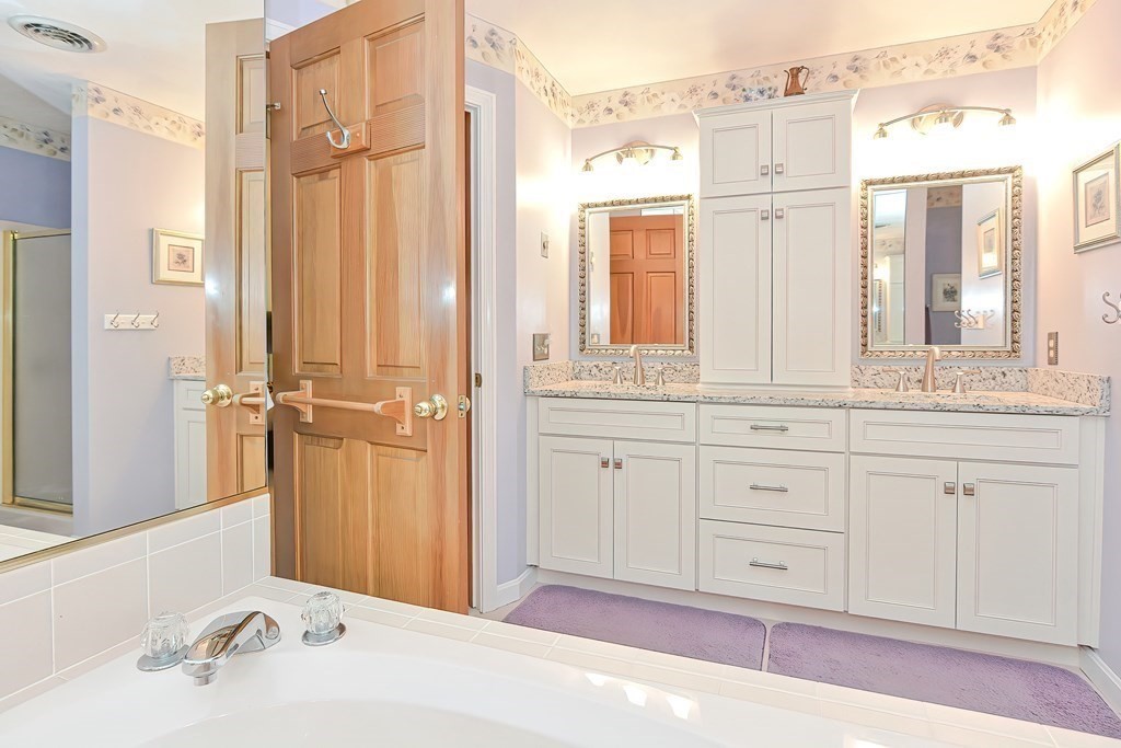 2 Harrison Place Franklin, MA 02038 - Photo 21 of 34 a bathroom with a sink and a mirror