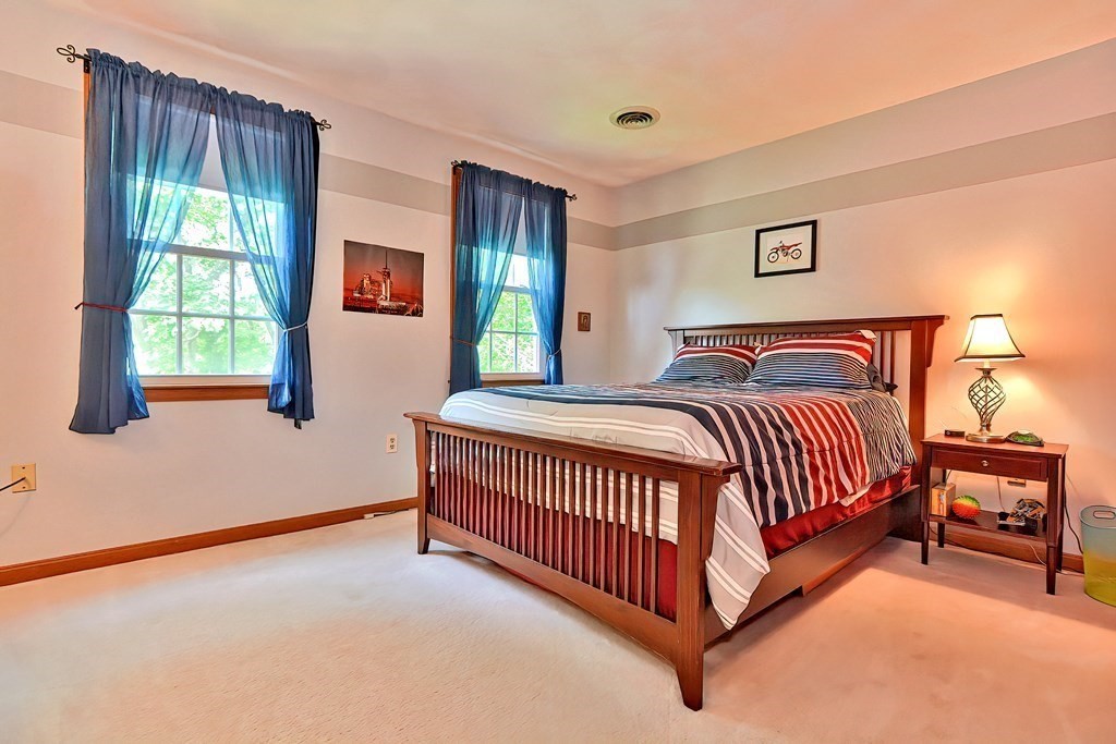 2 Harrison Place Franklin, MA 02038 - Photo 24 of 34 a bedroom with a bed and window