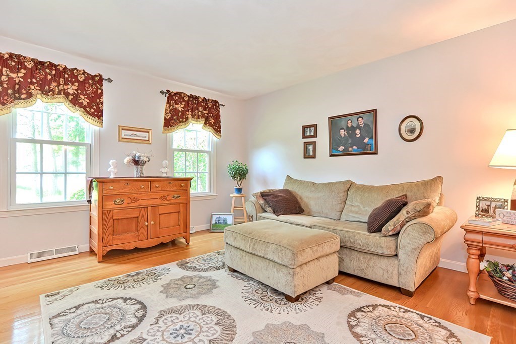 2 Harrison Place Franklin, MA 02038 - Photo 3 of 34 a living room with furniture and a window