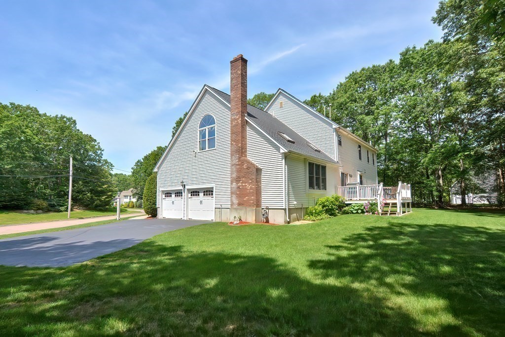 2 Harrison Place Franklin, MA 02038 - Photo 33 of 34 a front view of house with yard and green space