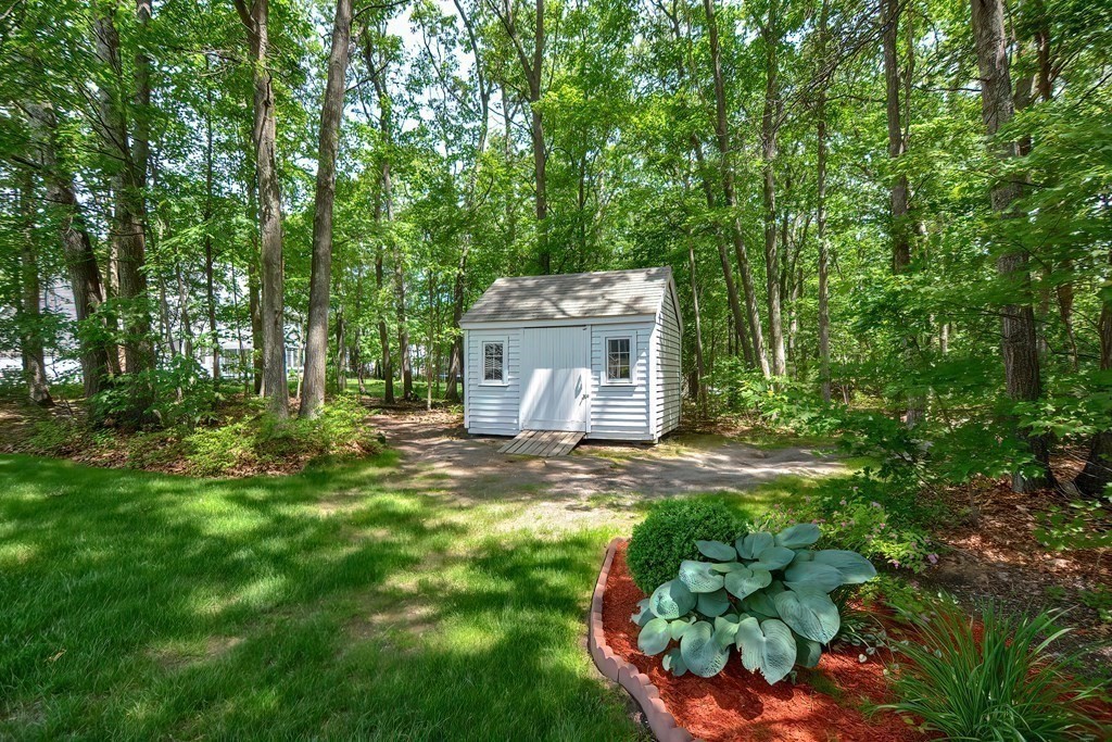 2 Harrison Place Franklin, MA 02038 - Photo 34 of 34 a backyard of a house with lots of green space
