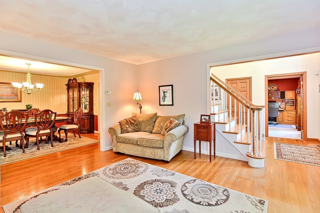 2 Harrison Place Franklin, MA 02038 - Photo 4 of 34 a living room with furniture and a wooden floor