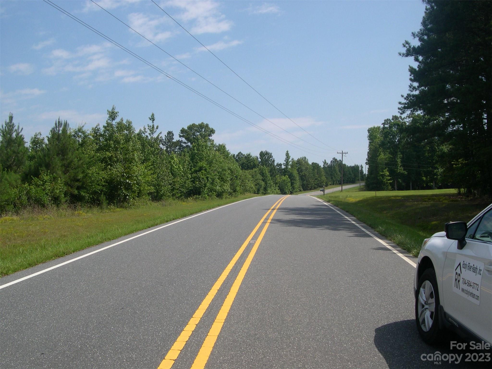 0 Pekin Road, Unit 2 Troy, NC 27371 - Photo 4 of 4 a view of a lake with a yard