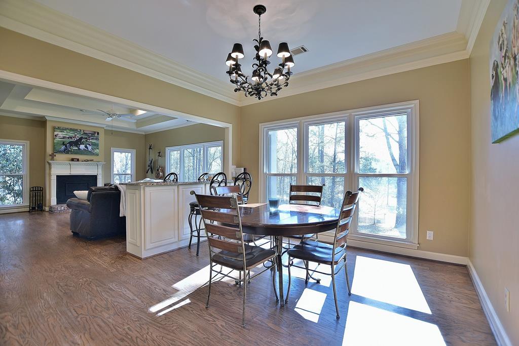 9234 River Road Fortson, GA 31808 - Photo 12 of 49 Breakfast area and den overlook small lake
