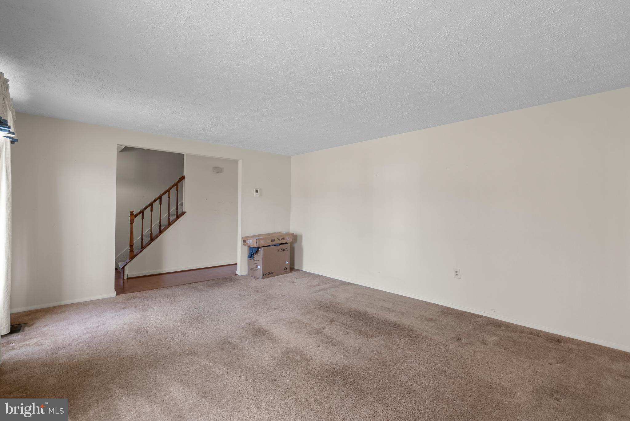 8745 Cardinal Forest Circle Laurel, MD 20723 - Photo 16 of 43 a view of an empty room with a hallway
