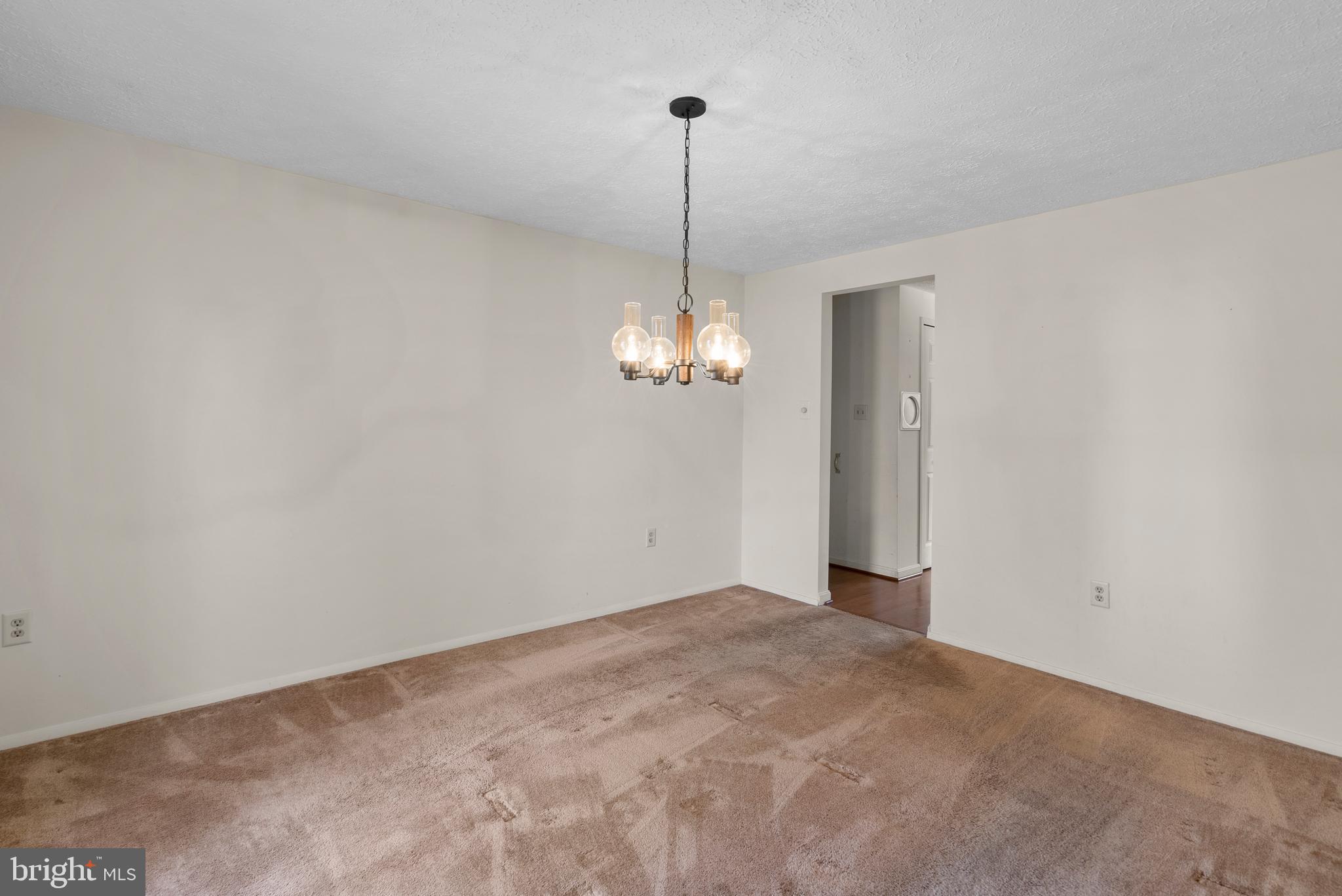 8745 Cardinal Forest Circle Laurel, MD 20723 - Photo 17 of 43 a view of a chandelier in big room and chandelier fan